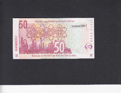 Beschrijving achterzijde: REFINERY